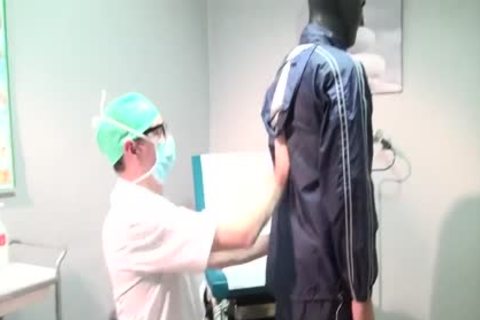 Fetish Patient In Shiny Nylon Rain Wear