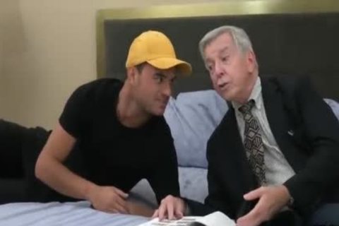 stylish older Grey Haired American Teacher And His Student